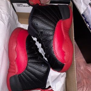 Red and black jordan 13s